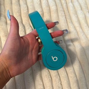 Beats Solo HD by Dr. Dre teal head phones